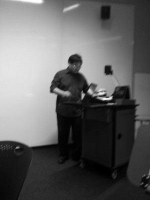 Our classmate, preparing for his presentation.